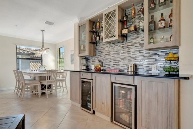 This stunning three-bedroom, two-bath second floor coach home on Lakewood National Golf Club in Florida - for sale on GolfHomes.com, golf home, golf lot