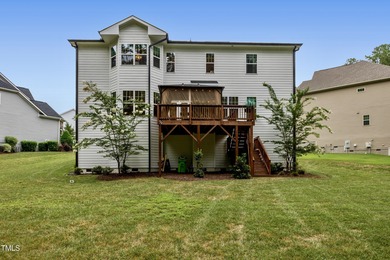 Behind the gates of Hasentree Country Golf Club community on Hasentree Club in North Carolina - for sale on GolfHomes.com, golf home, golf lot