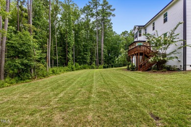 Behind the gates of Hasentree Country Golf Club community on Hasentree Club in North Carolina - for sale on GolfHomes.com, golf home, golf lot