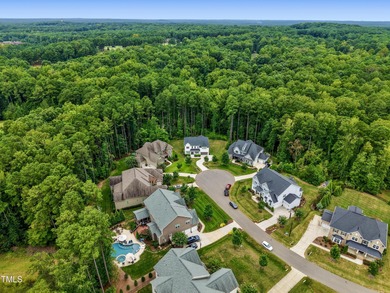 Behind the gates of Hasentree Country Golf Club community on Hasentree Club in North Carolina - for sale on GolfHomes.com, golf home, golf lot