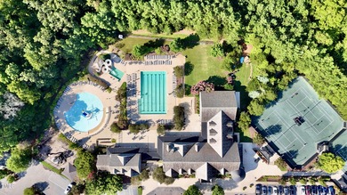 Behind the gates of Hasentree Country Golf Club community on Hasentree Club in North Carolina - for sale on GolfHomes.com, golf home, golf lot