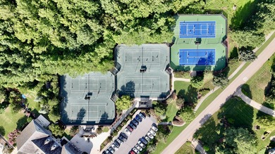 Behind the gates of Hasentree Country Golf Club community on Hasentree Club in North Carolina - for sale on GolfHomes.com, golf home, golf lot