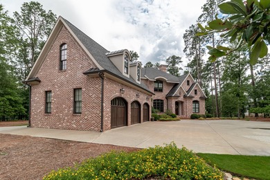 Gorgeous, stately all brick home situated on over an acre behind on Champions Retreat Golf Club in Georgia - for sale on GolfHomes.com, golf home, golf lot