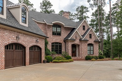 Gorgeous, stately all brick home situated on over an acre behind on Champions Retreat Golf Club in Georgia - for sale on GolfHomes.com, golf home, golf lot