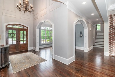 Gorgeous, stately all brick home situated on over an acre behind on Champions Retreat Golf Club in Georgia - for sale on GolfHomes.com, golf home, golf lot