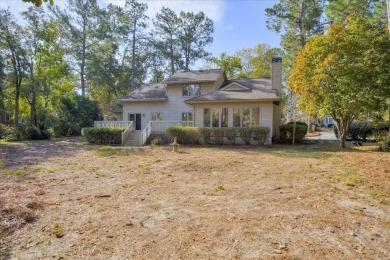 Welcome to 105 Live Oak Road. Enjoy golf course views of the on Woodside Plantation Country Club in South Carolina - for sale on GolfHomes.com, golf home, golf lot