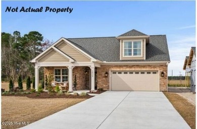 Beautiful Portico Ranch offers open concept with your private on Ocean Ridge Plantation in North Carolina - for sale on GolfHomes.com, golf home, golf lot