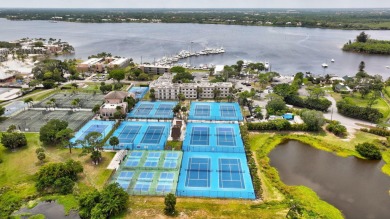 Welcome to your tropical oasis in Sandpiper Bay! This beautiful on Club Med Sandpiper in Florida - for sale on GolfHomes.com, golf home, golf lot