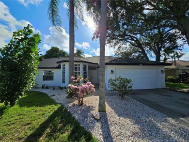 Step into this stunning split-floor plan residence and be on Tarpon Springs Golf Course in Florida - for sale on GolfHomes.com, golf home, golf lot