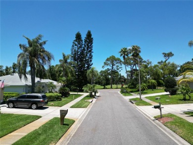 Step into this stunning split-floor plan residence and be on Tarpon Springs Golf Course in Florida - for sale on GolfHomes.com, golf home, golf lot