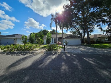 Step into this stunning split-floor plan residence and be on Tarpon Springs Golf Course in Florida - for sale on GolfHomes.com, golf home, golf lot