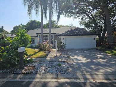 Step into this stunning split-floor plan residence and be on Tarpon Springs Golf Course in Florida - for sale on GolfHomes.com, golf home, golf lot