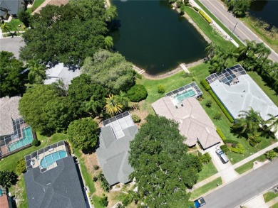 Step into this stunning split-floor plan residence and be on Tarpon Springs Golf Course in Florida - for sale on GolfHomes.com, golf home, golf lot