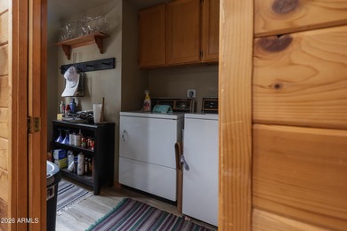 Cozy mountain retreat on a huge, heavily treed, large 36,600 sq on Pinewood Country Club in Arizona - for sale on GolfHomes.com, golf home, golf lot