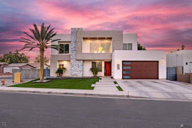 Welcome to this modern contemporary home in the sought-after on Cocopah Rio Colorado Golf Course in Arizona - for sale on GolfHomes.com, golf home, golf lot