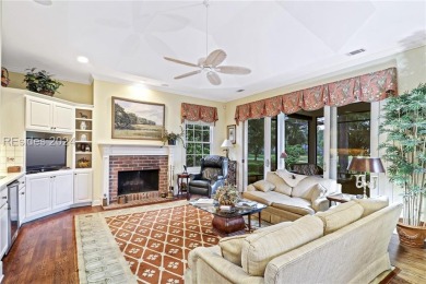 Enjoy the peaceful enlarged screen porch of this classic Belfair on Belfair Golf Club in South Carolina - for sale on GolfHomes.com, golf home, golf lot