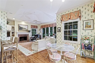 Enjoy the peaceful enlarged screen porch of this classic Belfair on Belfair Golf Club in South Carolina - for sale on GolfHomes.com, golf home, golf lot