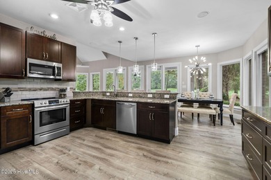 Discover luxury and comfort in this beautifully remodeled home on River Landing Golf Course in North Carolina - for sale on GolfHomes.com, golf home, golf lot