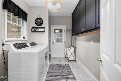 Discover luxury and comfort in this beautifully remodeled home on River Landing Golf Course in North Carolina - for sale on GolfHomes.com, golf home, golf lot