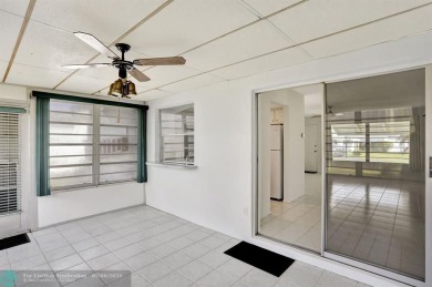 Welcome to this charming two bedroom, one and a half bath home on Leisureville Community Association in Florida - for sale on GolfHomes.com, golf home, golf lot