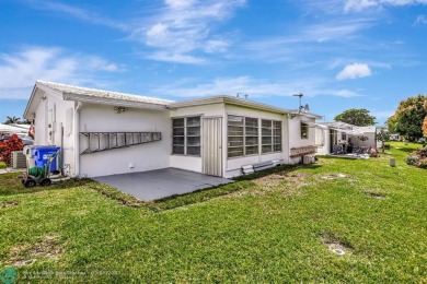 Welcome to this charming two bedroom, one and a half bath home on Leisureville Community Association in Florida - for sale on GolfHomes.com, golf home, golf lot