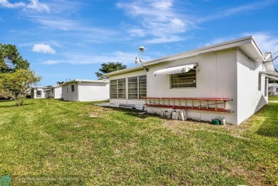 Welcome to this charming two bedroom, one and a half bath home on Leisureville Community Association in Florida - for sale on GolfHomes.com, golf home, golf lot