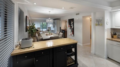 Enjoying enhanced privacy, serenity, and abundant natural light on Inverrary Country Club in Florida - for sale on GolfHomes.com, golf home, golf lot