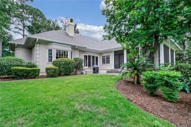 Enjoy the peaceful enlarged screen porch of this classic Belfair on Belfair Golf Club in South Carolina - for sale on GolfHomes.com, golf home, golf lot