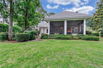 Enjoy the peaceful enlarged screen porch of this classic Belfair on Belfair Golf Club in South Carolina - for sale on GolfHomes.com, golf home, golf lot