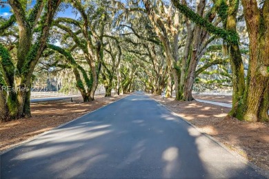 Enjoy the peaceful enlarged screen porch of this classic Belfair on Belfair Golf Club in South Carolina - for sale on GolfHomes.com, golf home, golf lot