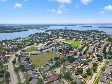 Discover your perfect family haven in this updated home! Ideally on Stewart Peninsula Golf Course in Texas - for sale on GolfHomes.com, golf home, golf lot