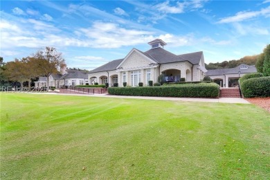 Enjoy the peaceful enlarged screen porch of this classic Belfair on Belfair Golf Club in South Carolina - for sale on GolfHomes.com, golf home, golf lot