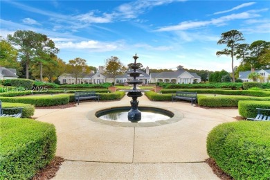 Enjoy the peaceful enlarged screen porch of this classic Belfair on Belfair Golf Club in South Carolina - for sale on GolfHomes.com, golf home, golf lot