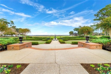 Enjoy the peaceful enlarged screen porch of this classic Belfair on Belfair Golf Club in South Carolina - for sale on GolfHomes.com, golf home, golf lot