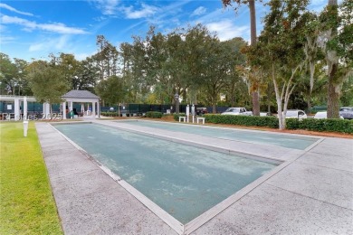 Enjoy the peaceful enlarged screen porch of this classic Belfair on Belfair Golf Club in South Carolina - for sale on GolfHomes.com, golf home, golf lot