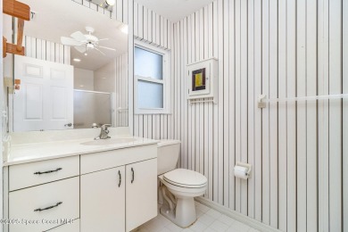 This popular expanded Montpelier model, located in a on Indian River Colony Club in Florida - for sale on GolfHomes.com, golf home, golf lot