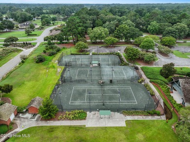 Discover luxury and comfort in this beautifully remodeled home on River Landing Golf Course in North Carolina - for sale on GolfHomes.com, golf home, golf lot