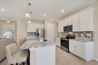 JUST REDUCED $20K - Assumable 3.25% VA Loan! Move-In Ready on Seminole Lakes Country Club in Florida - for sale on GolfHomes.com, golf home, golf lot