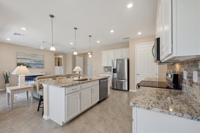JUST REDUCED $20K - Assumable 3.25% VA Loan! Move-In Ready on Seminole Lakes Country Club in Florida - for sale on GolfHomes.com, golf home, golf lot
