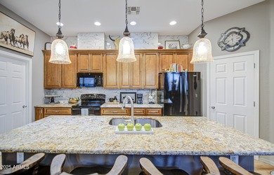 Experience Elevated Living In This Stunning Luxury Condominium on Anthem Golf and Country Club  in Arizona - for sale on GolfHomes.com, golf home, golf lot