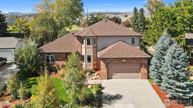 All-brick charmer on a cul-de-sac! This gorgeous home in the on The Olde Course At Loveland in Colorado - for sale on GolfHomes.com, golf home, golf lot