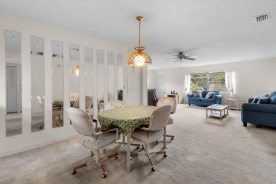 Welcome to this 2-bedroom, 2-bath home located in the highly on Falcon Watch Golf Club in Florida - for sale on GolfHomes.com, golf home, golf lot