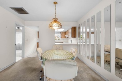 Welcome to this 2-bedroom, 2-bath home located in the highly on Falcon Watch Golf Club in Florida - for sale on GolfHomes.com, golf home, golf lot