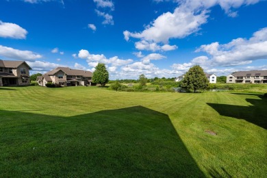 Crafted by Lowell Custom Homes this Geneva National townhome on Geneva National Golf Club in Wisconsin - for sale on GolfHomes.com, golf home, golf lot