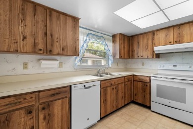 Welcome to this 2-bedroom, 2-bath home located in the highly on Falcon Watch Golf Club in Florida - for sale on GolfHomes.com, golf home, golf lot