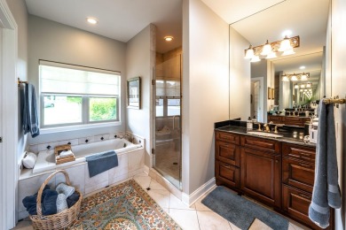 Crafted by Lowell Custom Homes this Geneva National townhome on Geneva National Golf Club in Wisconsin - for sale on GolfHomes.com, golf home, golf lot