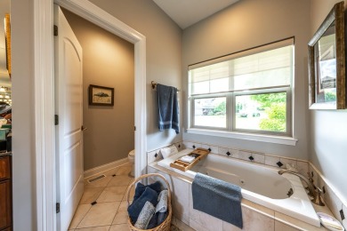 Crafted by Lowell Custom Homes this Geneva National townhome on Geneva National Golf Club in Wisconsin - for sale on GolfHomes.com, golf home, golf lot