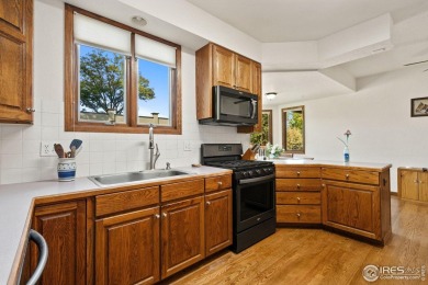All-brick charmer on a cul-de-sac! This gorgeous home in the on The Olde Course At Loveland in Colorado - for sale on GolfHomes.com, golf home, golf lot