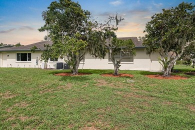 Welcome to this 2-bedroom, 2-bath home located in the highly on Falcon Watch Golf Club in Florida - for sale on GolfHomes.com, golf home, golf lot