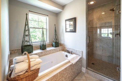 Crafted by Lowell Custom Homes this Geneva National townhome on Geneva National Golf Club in Wisconsin - for sale on GolfHomes.com, golf home, golf lot